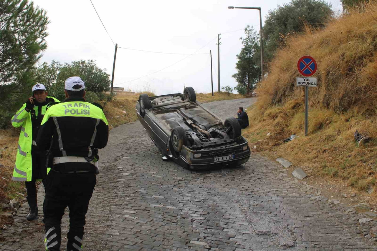 EFELER İLÇESİNDE FRENİ TUTMAYAN OTOMOBİL TAKLA ATTI
